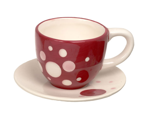 Taza y plato con topos